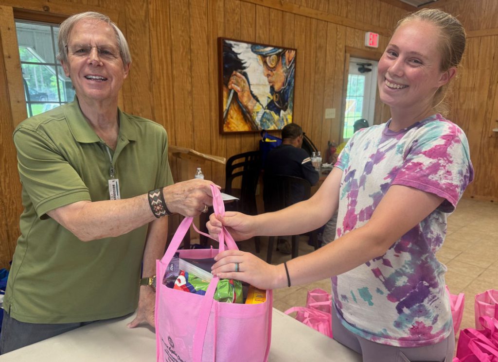 Racetrack chaplain Jay Hurley distributes hygiene products to Colonial Downs backstretch community