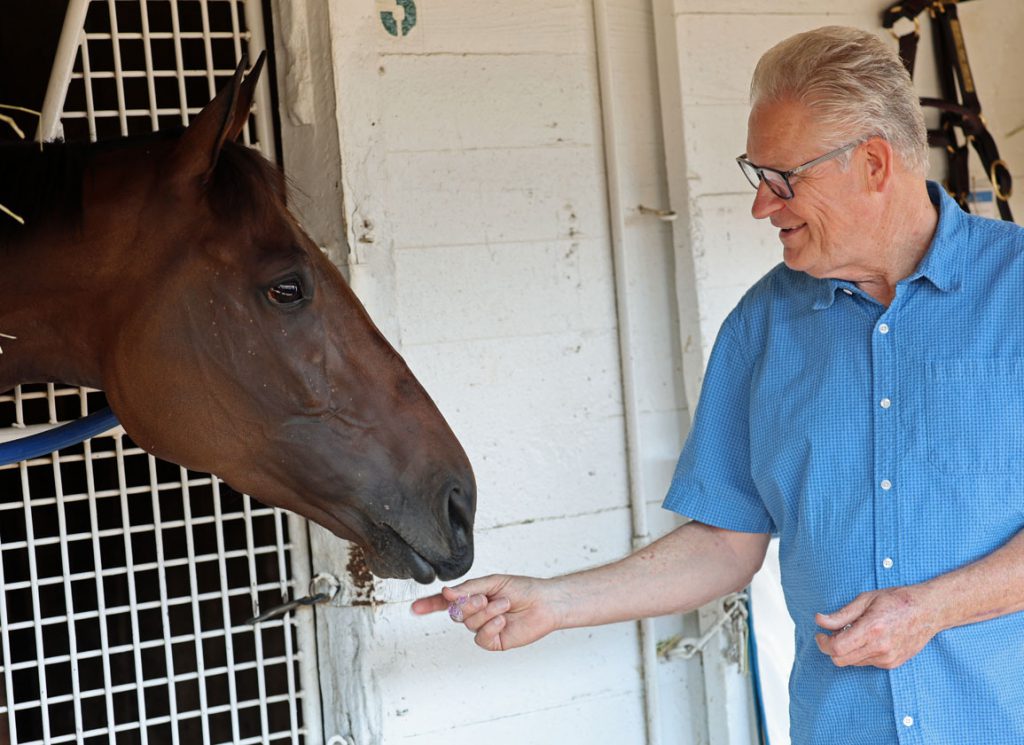 Kenny McPeek assistant trainer Greg Geier and champion Thorpedo Anna at Churchill Downs.